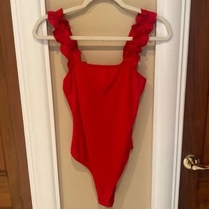 Red ribbed ruffle bodysuit